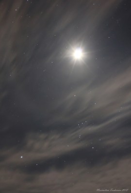 Moon halo with Orion